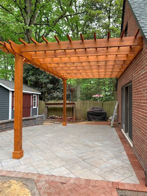 metal pergola attached to house|pergola attached to covered patio.